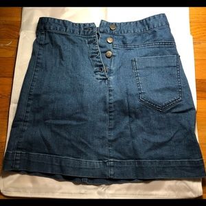 Asymmetrical button up denim skirt. Great condition, only worn twice.